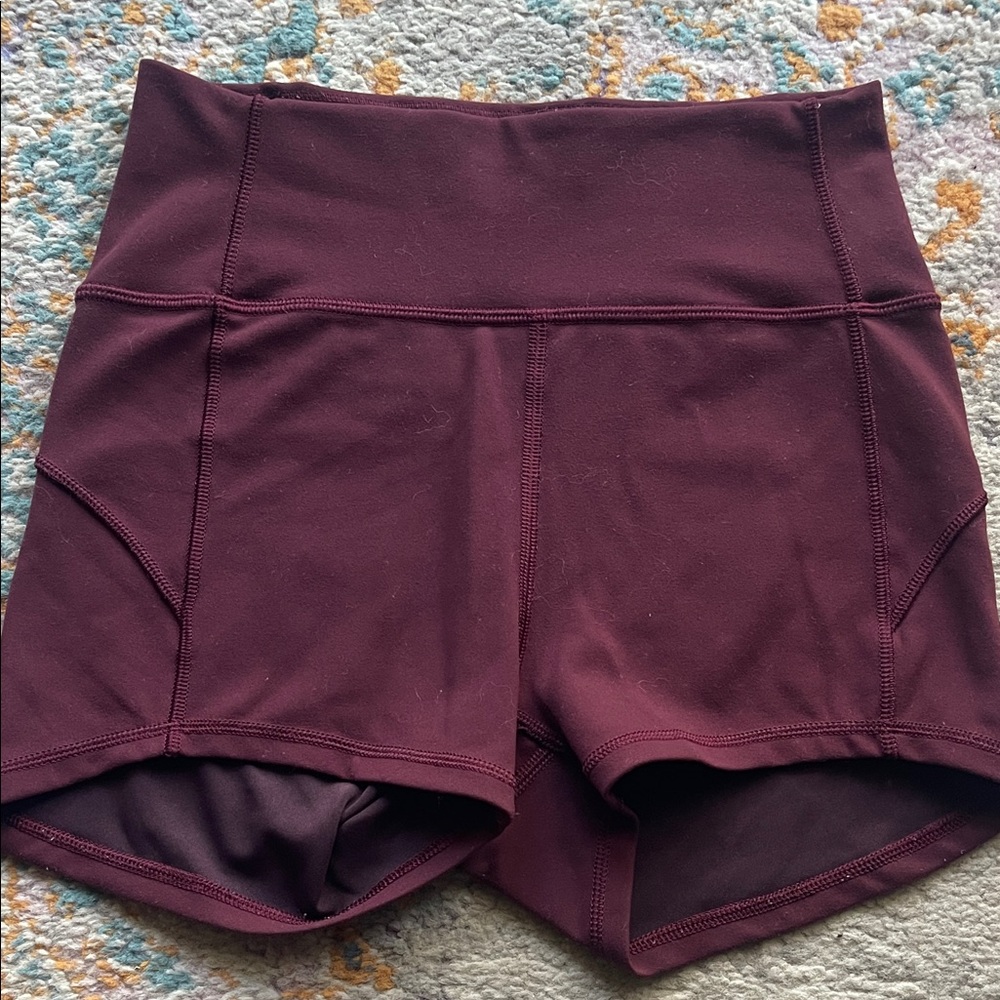 Lululemon burgundy biker shorts size 4 a little bit longer in the back